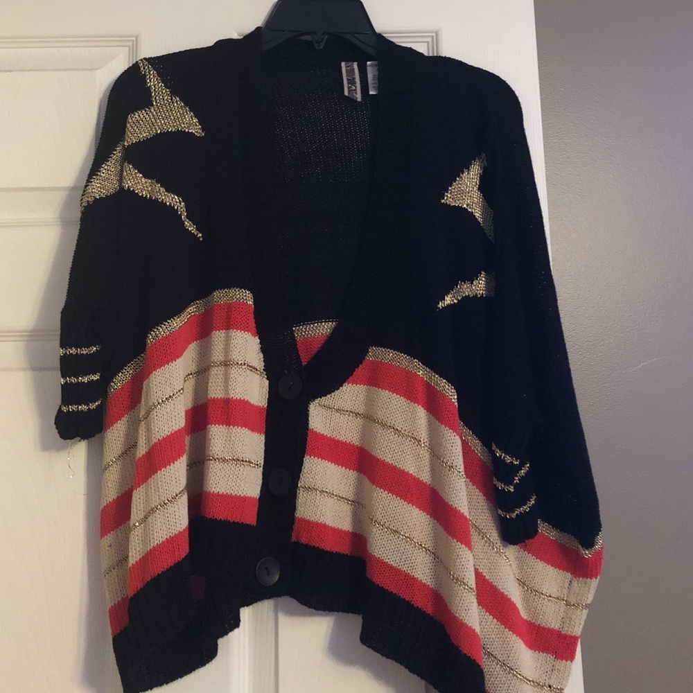 Button down quarter length sweater.